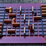 Quais são as regras do jogo Crokinole? Aprenda aqui!